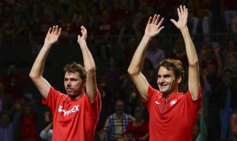 Federer sets up all Swiss tennis showdown