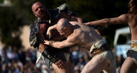 Gladiators and horsemen fete Rome's birthday