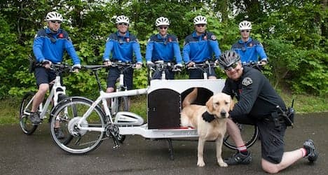Lausanne cops pioneer bike for dog squad