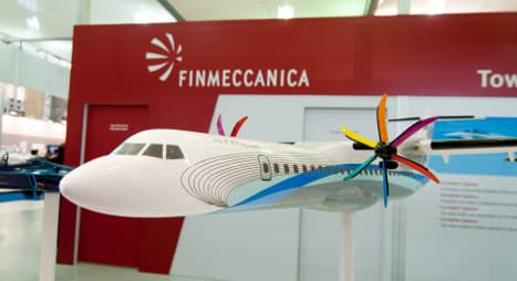 Italy's Finmeccanica switches to loss