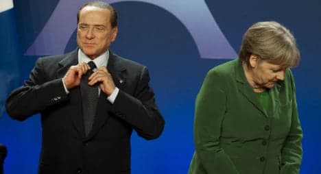 'I've never had problems with Merkel': Berlusconi
