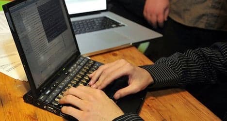 Hacker held in Bangkok over Swiss bank fraud   
