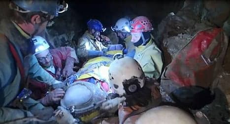 Rescuers move injured cave explorer