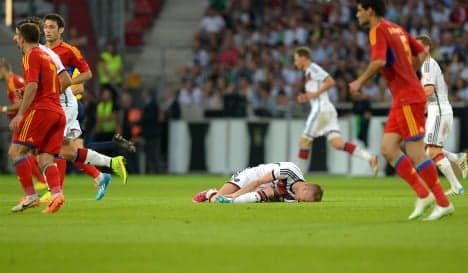Reus injury dampens Germany's six-goal romp