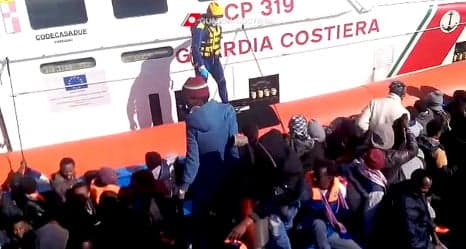 Seven arrested in Italy after migrant boat surge