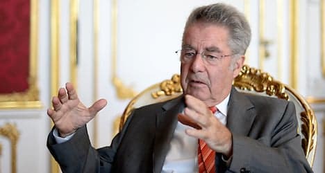 Fischer defends Putin's Austrian visit