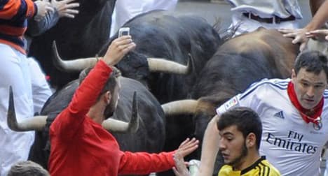 Risky business: Man snaps bull run selfie