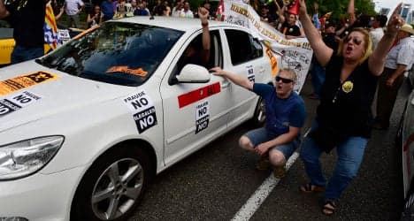 Barcelona police crack down on Uber drivers
