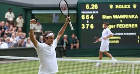 Federer struggles past Wawrinka in epic duel