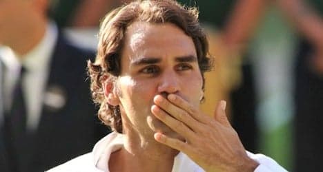 Defeated Federer pledges return to Wimbledon