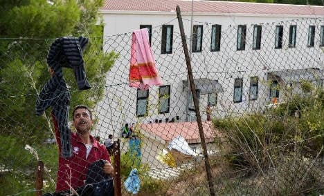 Lampedusa feels strain as new migrants arrive