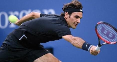 Federer advances to US Open second round
