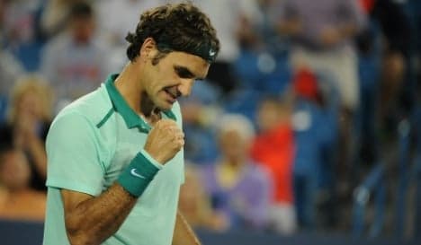 Federer poised to make history in New York