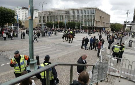 Swedes throw stinky fish at calm neo-Nazi rally
