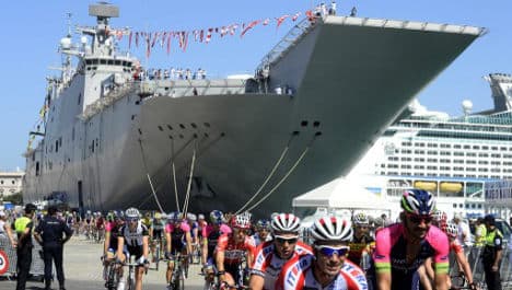 Vuelta cyclists 'set sail' from aircraft carrier