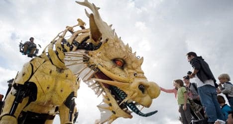 IN IMAGES: Artists unveil mechanical dragon