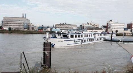 Cargo barge and ferry collide on Rhine in Basel
