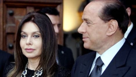 Berlusconi's ex-wife sees alimony cut by third