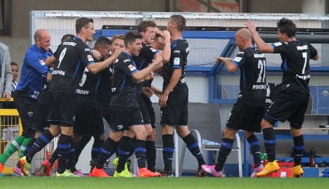 Wonder goal puts new boys Paderborn on top