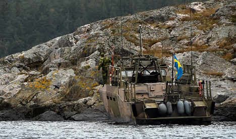 Sweden ready to use force to surface sub