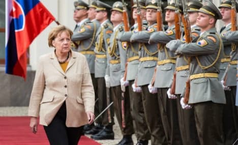 Merkel tells allies to pay Ukraine's gas debts