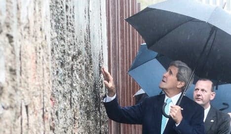 Kerry's challenge to Russia at Berlin Wall