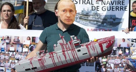 Russians say France will hand over warship