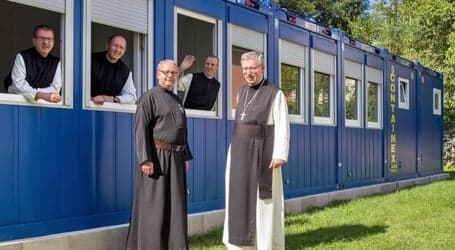 Trainee priests housed in containers
