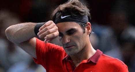 Federer struggles to win opener at Paris Masters