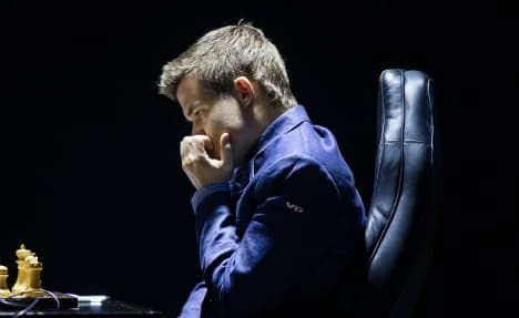 World Chess Champs: Carlsen wins nailbiter