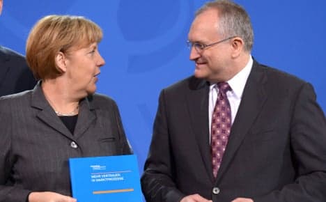 Top economists take aim at Merkel government
