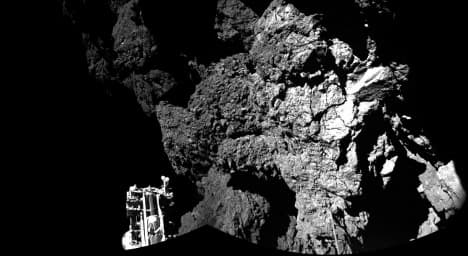 Comet probe Philae 'perched on steep slope'