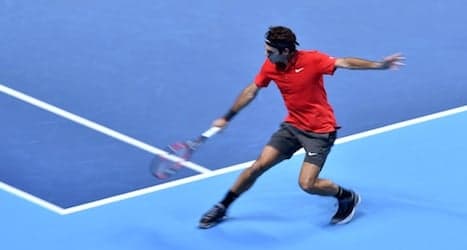 Federer cruises to two-set victory over Nishikori