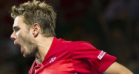Federer loss offsets Wawrinka's win in Lille