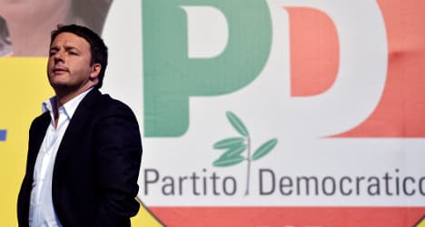 Poll win for Renzi but voters fire warning shots