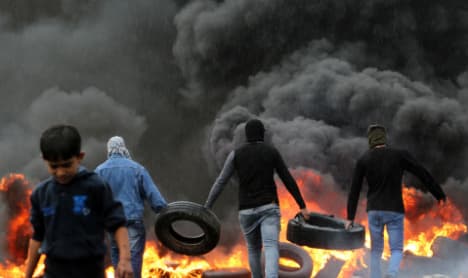 Italian activist shot in West Bank clash