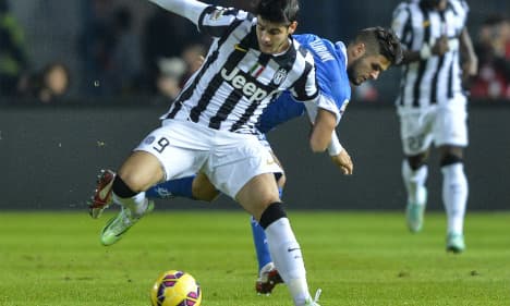 Juventus go three points clear as Roma slip