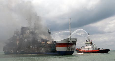Hundreds still trapped on burning ferry