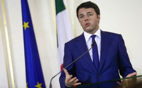 Italy's credit rating lowered by S&amp;P