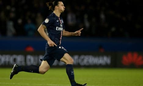 Ibrahimovic brace takes PSG top