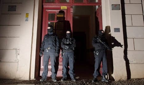 Police raid suspected Islamists' homes