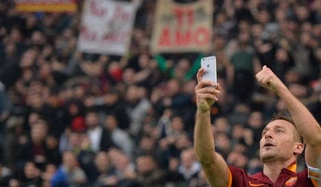 Totti celebrates derby double with 'selfie'
