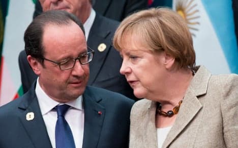 Merkel to attend Paris mass rally on Sunday
