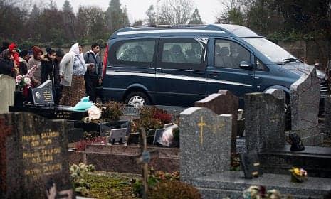 Roma baby buried after French racism row