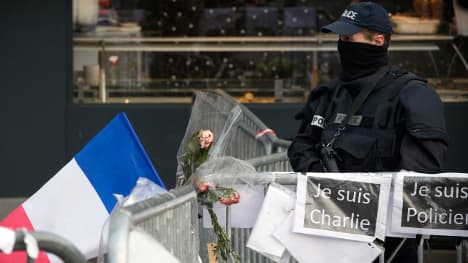 Four men charged with helping Paris gunman