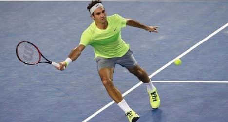 Federer bounces back for second round win