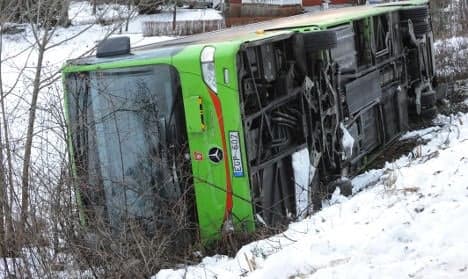 'School' bus flips over on icy road in Sweden