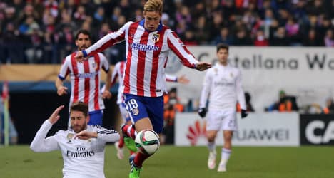 Atlético bead Real as Torres returns