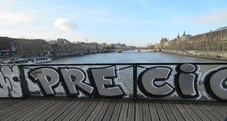Vandals cover anti-'love lock' panels with graffiti