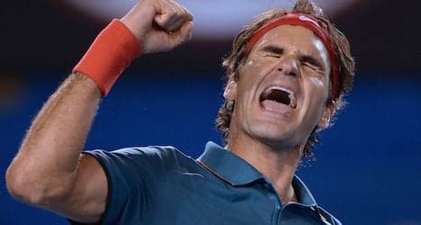 Federer survives scare to advance at Brisbane